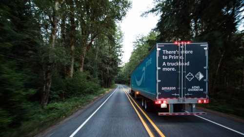 close up of amazon prime trailer door in woods.png
