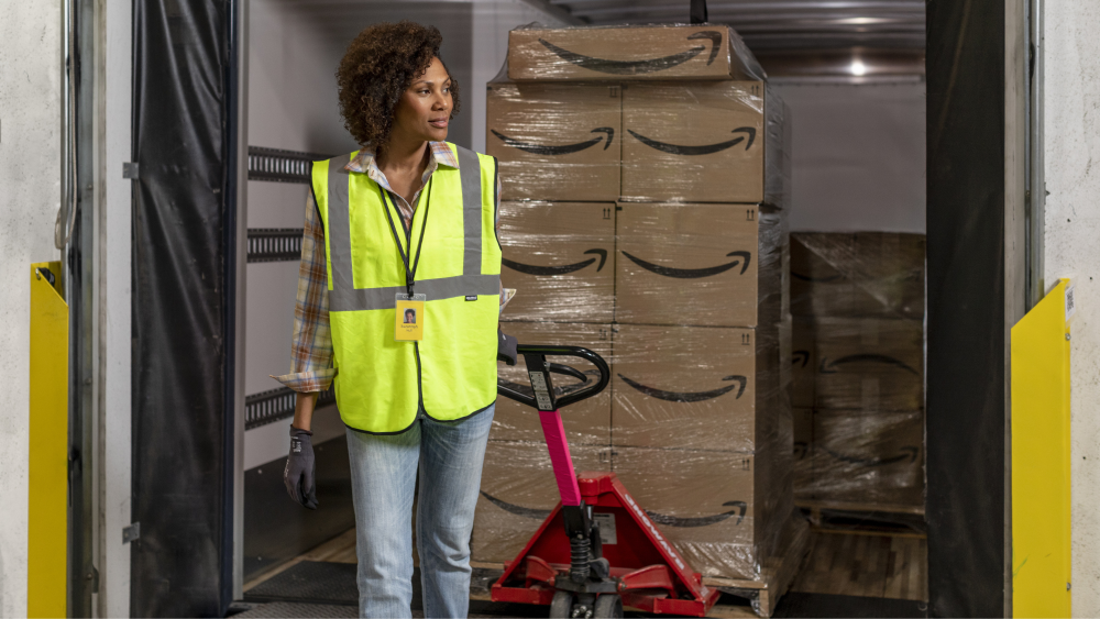 woman pulling pallet of bxo truck freight (landscape).png