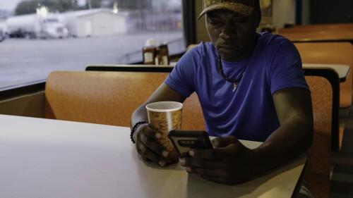 Relay 2023_BTR_Photoshoot_Trevor in Diner_Closeup.jpg