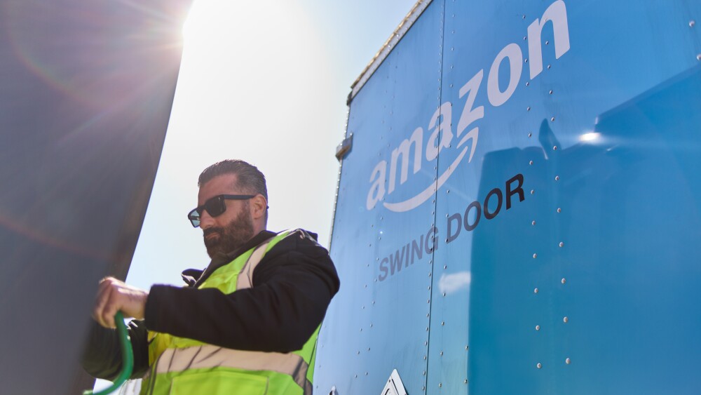 Bayar Palani attaching semi cab to Amazon trailer