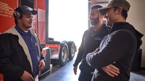 Bayar Palani talking to drivers