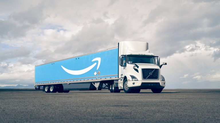 standalone semi-truck hauling an amazon trailer